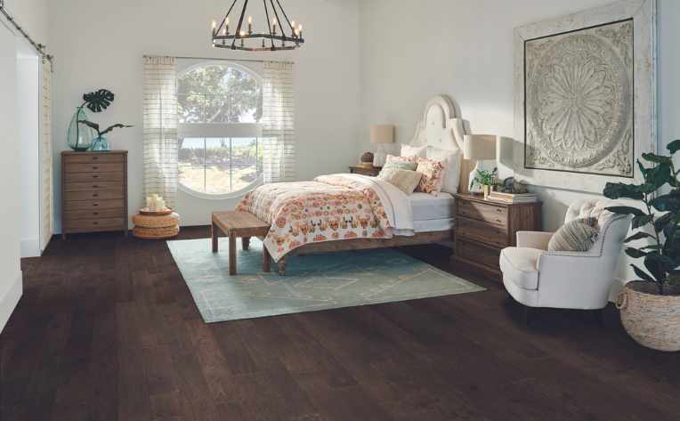 dark hardwood flooring in contemporary modern bedroom